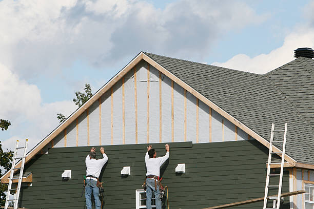 Professional Storm Damage Siding Repair technician working in West Sunbury, PA
